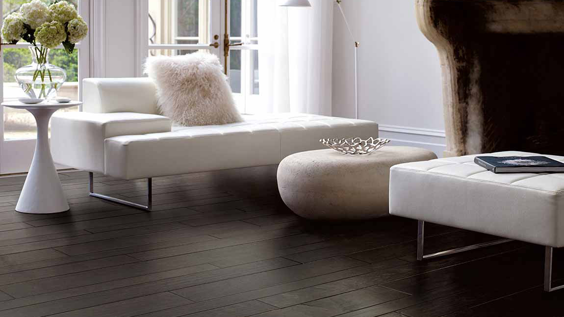Hardwood flooring in a modern living room, installation services available.